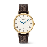 Classic men’s watch with a gold PVD-plated case, white dial featuring black Roman numerals, blue hands, and a date display, paired with a dark brown crocodile-embossed leather strap.