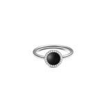 Silver ring with a round black agate centrepiece, encircled by sparkling white cubic zirconia, highlighting its elegant and contemporary style.