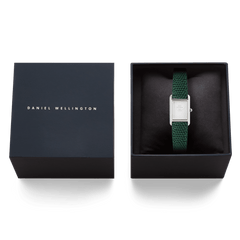 Bound Mini Green Lizard Silver watch with a rectangular silver case and green textured leather strap, elegantly presented in a black Daniel Wellington gift box.