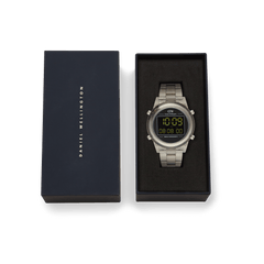 Retro Digital Light Grey Light Grey watch with a transparent light grey strap and round digital face, presented in a Daniel Wellington branded gift box.