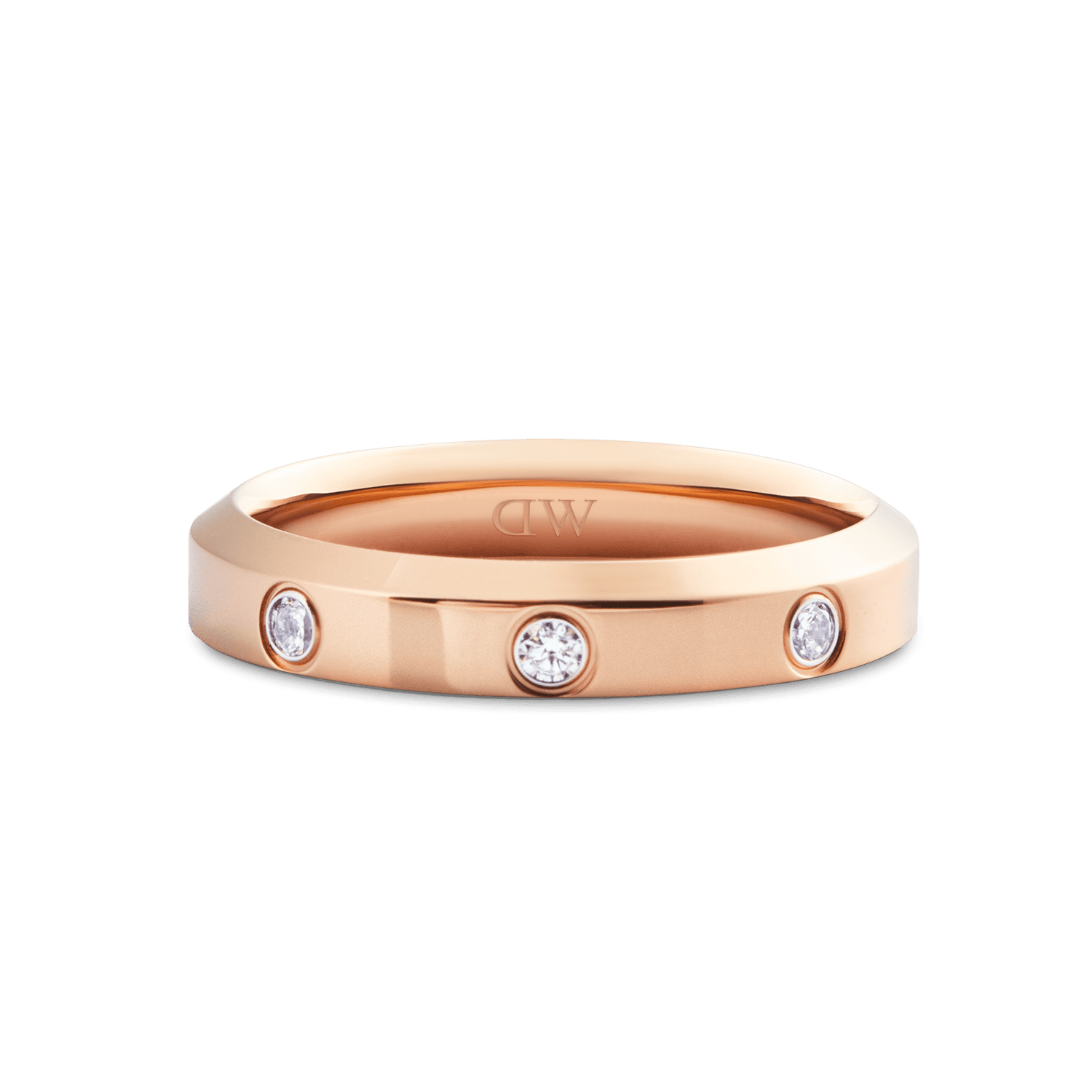 Classic Lumine Ring Rose Gold 4mm with a smooth, polished rose gold band and three round cubic zirconia stones set evenly around the ring, highlighting its minimalist and elegant style.
