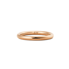 A slim rose gold band ring with a polished finish and rounded edges, featuring a minimalist design that highlights its modern, elegant style.