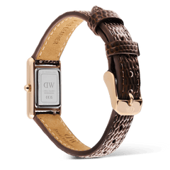 Back view of the Bound Mini Dark Brown Lizard Rose Gold watch highlighting the engraved stainless steel case back, textured brown lizard-grain leather strap, and rose gold pin buckle closure.