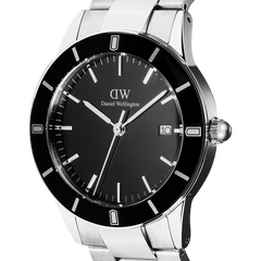 Close-up of the Iconic Paradigma Link Black Enamel watch, highlighting its minimalist black dial, silver-tone hands and markers, date window, and polished stainless steel case with a distinctive index bezel.