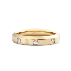 Classic Lumine Ring Gold 4 mm featuring a polished gold band with three round cubic zirconia crystals set evenly across the front, showcasing a minimalist and elegant design.