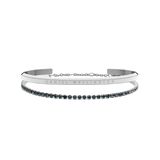 Classic Bracelet Silver and Tennis Bracelet Nightfall Silver set featuring a polished silver cuff with subtle branding and a delicate tennis bracelet adorned with deep nightfall-toned stones, displayed side by side against a plain background.
