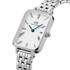 Quadro Roman Numerals 5-Link Silver watch with a rectangular stainless steel case, white dial, black roman numerals, blue hands, and a polished five-link silver bracelet, highlighting its elegant and modern design.