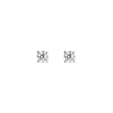A pair of Mirelle Solitaire Stud Earring Silver featuring petite round white cubic zirconia crystals set in polished silver, showcasing a minimalist and timeless design.