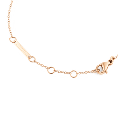 Detail of the Mirelle Solitaire Bracelet Rose Gold showing the adjustable rose gold chain, secure clasp, and Daniel Wellington engraved tag.