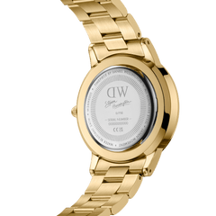 Back view of the Daniel Wellington Iconic Link Dual Tone Gold watch, showing the engraved limited edition serial number and Steven Harrington’s signature on the stainless steel case.