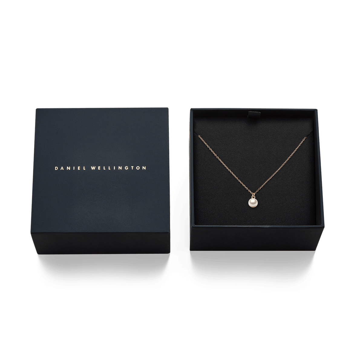 Pearl Necklace Rose Gold presented in an elegant Daniel Wellington gift box, featuring a delicate rose gold chain and a single Swarovski glass pearl pendant.