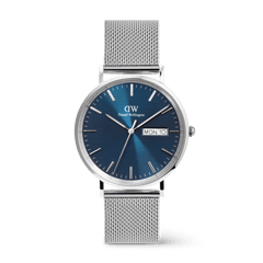 Classic Day Display Sterling Arctic men's watch featuring a blue dial with a semi-transparent triangle pattern, day and date window, and a stainless steel mesh strap with a safety buckle.