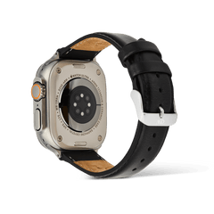 Apple Watch Ultra with the Smartwatch Leather Strap Sheffield Silver, showing the back of the watch and the black Sheffield leather strap with stitched detailing and a polished silver pin buckle.