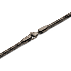 Detail of the Tide Mesh Necklace Graphite 2.8 showing the graphite stainless steel mesh chain and secure lobster clasp with a polished finish.