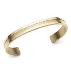 Elan Bracelet Gold featuring a polished gold finish, minimalist open cuff design, and engraved Daniel Wellington branding, crafted from stainless steel for a modern, elegant look.