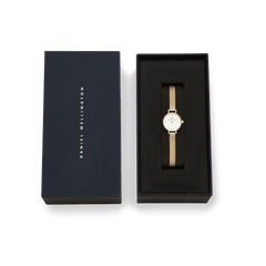 Petite Mini Evergold gold mesh strap watch presented in a sleek black Daniel Wellington gift box, showcasing its minimalist white dial and elegant gold finish, ideal for gifting on special occasions.