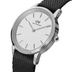 The Iconic Black NATO White Dial watch features a sleek silver case, minimalist white dial, and textured black NATO strap, highlighting its modern yet timeless design.