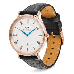 Classic Roman Numerals Date Black Croc Belly Rose Gold watch with a rose gold case, white dial, black Roman numerals, blue hands, date window at six o’clock, and a black croc-embossed genuine leather strap with pin buckle closure.