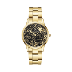 Gold Daniel Wellington Iconic Link watch with a black dial featuring Steven Harrington’s gold illustrations, paired with a polished gold stainless steel bracelet and secure clasp.
