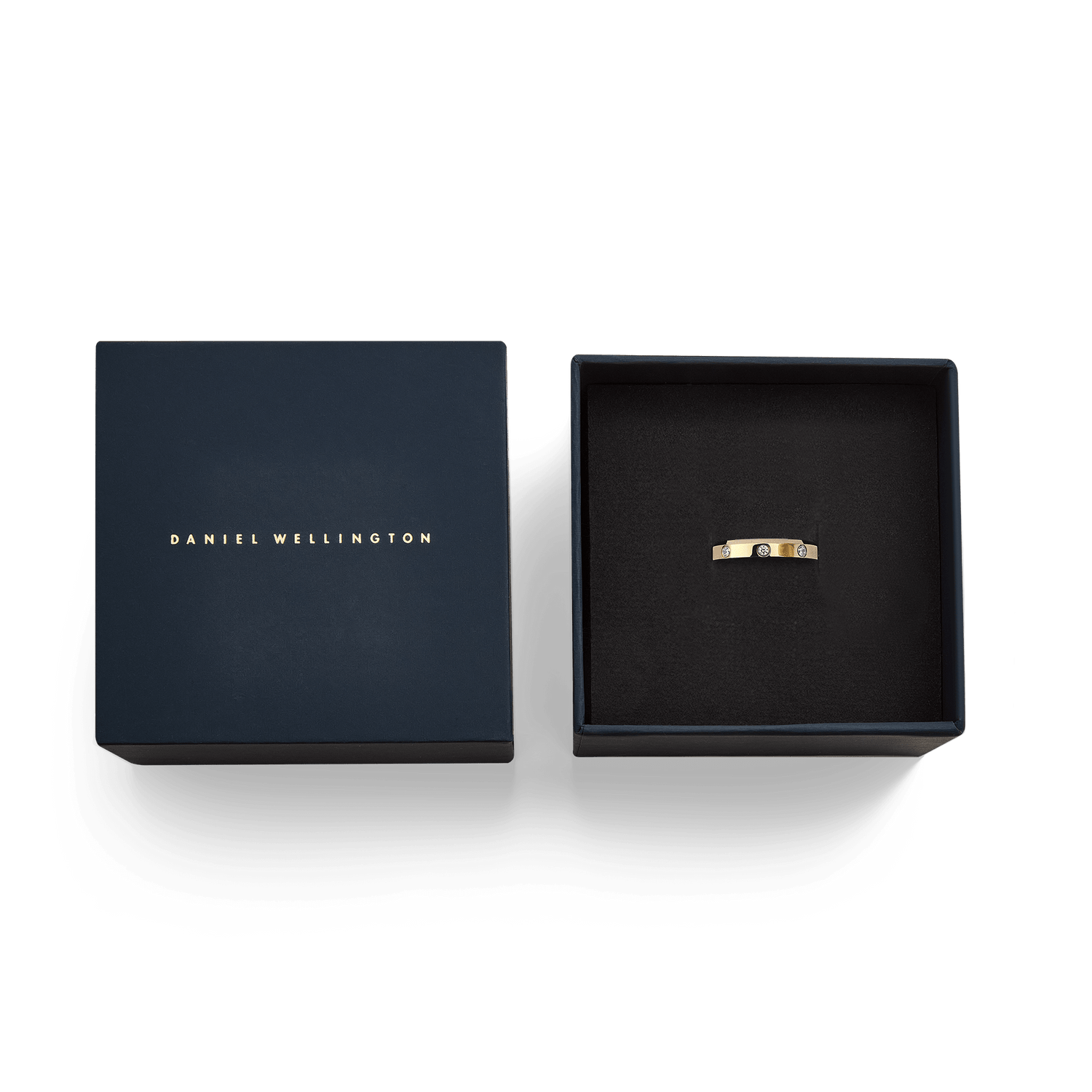 Classic Lumine Ring Gold 4 mm presented in a signature Daniel Wellington navy box, highlighting the gold band with cubic zirconia crystals for a sophisticated gifting experience.