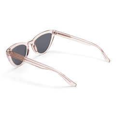 Lynx Bio-Acetate Clear Pink/Black sunglasses with a transparent pink cat eye frame, dark nylon lenses, and elegantly curved arms designed for comfortable, stylish wear.