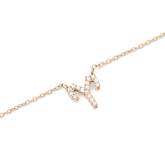 Gold chain necklace featuring a fixed Aries zodiac pendant, set with sparkling crystals for a refined and personal touch.