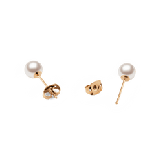 Pearl Stud Earring Rose Gold displayed with white Swarovski glass pearls and slim rose gold mounts, showing the secure butterfly backings and minimalist design suitable for sensitive ears.