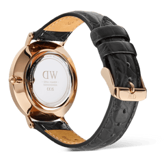 Rear view of the Classic Roman Numerals Date Black Croc Belly Rose Gold watch, highlighting the rose gold case, engraved case back, and black croc-embossed genuine leather strap with a matching rose gold pin buckle.