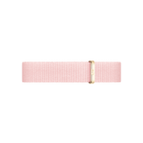 Rosewater Strap Gold displays a pastel pink NATO watch strap crafted from recycled polyester, featuring a gold buckle and minimalist styling for Daniel Wellington watches.