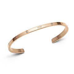 Classic Lumine Bracelet RG in rose gold, featuring a slim adjustable cuff with six sparkling crystals and a smooth, minimalist finish suitable for everyday wear or layering with other jewellery.