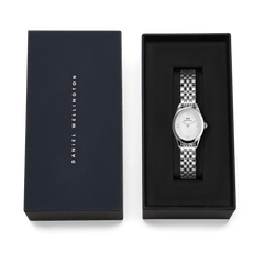Ophelia Mini Silver watch with a polished oval case and 5-link bracelet, presented in a black Daniel Wellington gift box, ideal for gifting or adding to your collection.