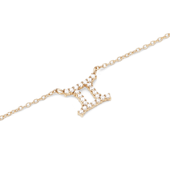 Gold chain necklace with a Gemini zodiac pendant, set with sparkling hand-placed crystals for a polished and personal finish.