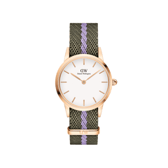 Petite ladies watch with a rose gold case, minimalist white dial, and a green and purple NATO strap, designed for everyday comfort and style. The adjustable recycled nylon strap and refined rose gold details make it a versatile accessory for casual or work outfits.