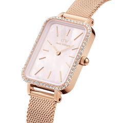 Quadro Lumine Bezel Melrose Pink MOP rose gold watch for women with a rectangular case, pink mother of pearl dial, sparkling gemstone bezel, and a slim mesh strap.