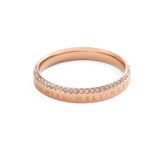 Classic Aura Ring Rose Gold with a slim rose gold band, featuring a row of white crystals along the chamfered edge and subtle engraved branding for a modern, elegant touch.