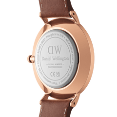 Classic Multi-Eye St Mawes Arctic Rose Gold men's watch showing the back of the rose gold case, engraved details, and brown leather strap with visible stitching.