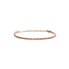 Slim rose gold tennis bracelet featuring apricot-coloured crystals, adjustable chain and lobster clasp, designed for a refined and modern look.