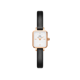 Quadro Mini Sheffield Rose Gold ladies watch with a petite rectangular rose gold case, minimalist white dial, and slim black leather strap, designed for comfort and understated elegance.
