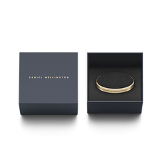 Elan Bracelet Gold presented in a sleek Daniel Wellington gift box, highlighting its polished gold finish and engraved branding, ideal for gifting or special occasions.