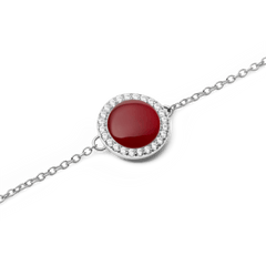 Close-up of the Audrey Bracelet Red Agathe Silver, showing the domed red agate centrepiece encircled by sparkling white cubic zirconia crystals on a fine silver chain.