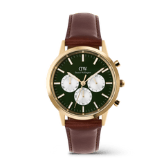 Gold men’s chronograph watch with an emerald green dial, panda-style sub-dials, and a brown stitched leather strap, featuring luminous hands and indexes for clear visibility.