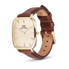 Daniel Wellington Marlon St Mawes Linen Gold men’s watch with a gold cushion-shaped case, linen-textured dial, minimalist hour markers, and an adjustable brown leather strap.