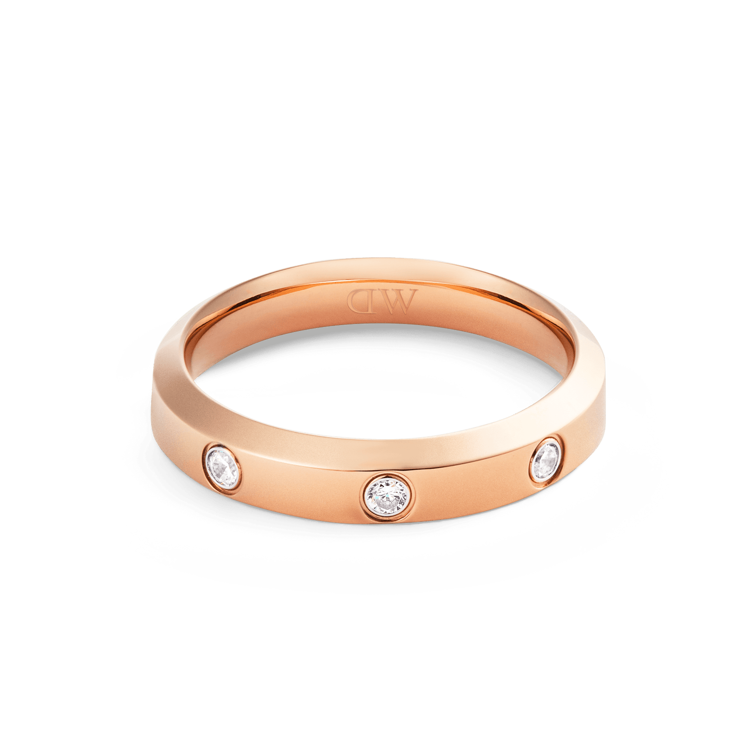 Classic Lumine Ring Rose Gold 4mm with a sleek rose gold finish and three cubic zirconia stones set evenly around the band, offering a refined and modern look.