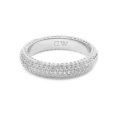 The Pavé Ring Silver 5 mm features a wide band with a multi-row pavé setting of sparkling white crystals, offering a modern and elegant silver finish suitable for everyday wear or special occasions.