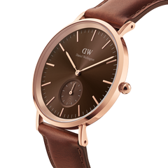 Classic Multi-Eye St Mawes Amber Rose Gold men's watch with a polished rose gold case, amber brown dial, minimalist hour markers, and a genuine brown leather strap, shown in a close-up angle highlighting its refined chronograph design.