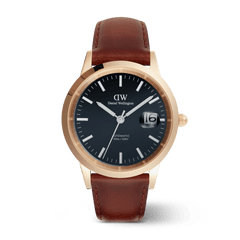 Iconic St Mawes Automatic Rose Gold watch featuring a blue enamel dial, rose gold-plated stainless steel case, and a brown Italian leather strap, with luminous markers and a date display.