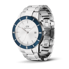 Iconic Paradigma Link Blue Bezel Silver men’s watch featuring a satin matte blue bezel, white dial with minimalist index markings, date display, and a polished stainless steel three-link bracelet.