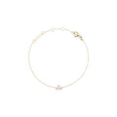 Crystal Zodiac Chain Bracelet Gold featuring a delicate gold chain with an adjustable clasp and a sparkling Libra zodiac charm set with crystals.