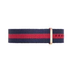 Oxford Strap Rose Gold watch strap featuring a bold navy blue and red stripe in durable polyester, finished with a sleek rose gold buckle for a stylish and contemporary look.