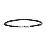Slim black braided leather bracelet with a polished silver stainless steel clasp, showcasing a minimalist and refined design suitable for everyday wear.